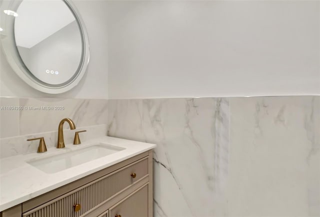 2807 NE 164th St Unit 2, North Miami Beach, FL 33160 - bathroom with vanity and tile walls