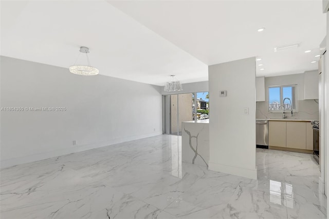2807 NE 164th St Unit 2, North Miami Beach, FL 33160 - unfurnished living room featuring baseboards, recessed lighting, light marble finish flooring, a chandelier, and a sink