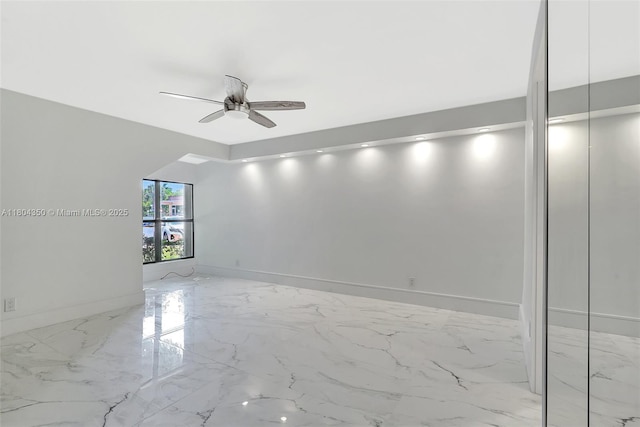 2807 NE 164th St Unit 2, North Miami Beach, FL 33160 - unfurnished room with marble tiled flooring, ceiling fan, and baseboards