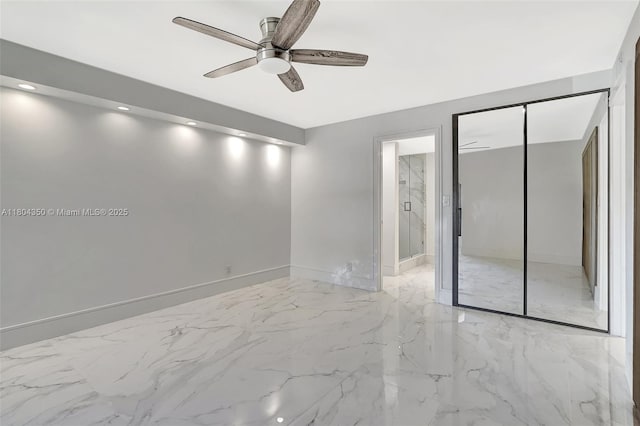2807 NE 164th St Unit 2, North Miami Beach, FL 33160 - empty room with marble finish flooring, ceiling fan, baseboards, and recessed lighting