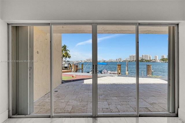 2807 NE 164th St Unit 2, North Miami Beach, FL 33160 - entryway featuring a water view, a view of city, and french doors