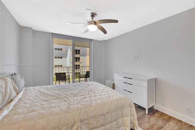 800 SE 20th Ave Unit 303, Deerfield Beach, FL 33441 - bedroom featuring light wood-style floors, access to outside, baseboards, and a ceiling fan