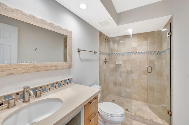 800 SE 20th Ave Unit 303, Deerfield Beach, FL 33441 - bathroom featuring a shower stall, toilet, vanity, and recessed lighting