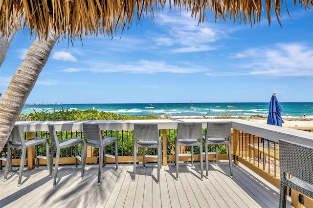 800 SE 20th Ave Unit 303, Deerfield Beach, FL 33441 - wooden deck featuring view of water and beach