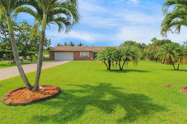 12411 SW 12th St, Davie, FL 33325 - ranch-style home featuring driveway, a garage, a front lawn, and brick siding