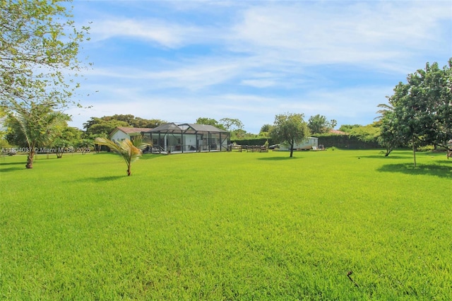12411 SW 12th St, Davie, FL 33325 - view of green lawn with glass enclosure