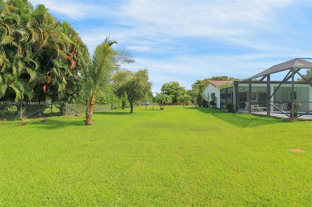 12411 SW 12th St, Davie, FL 33325 - view of green lawn featuring a lanai and an outdoor pool