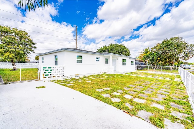 8330 NW 35th Pl, Miami, FL 33147 - view of front of property featuring stucco siding