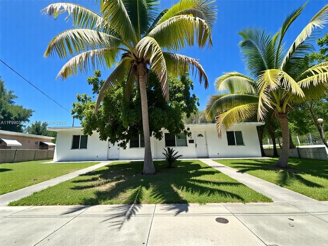 16204 NE 18th Ct, North Miami Beach, FL 33162 - view of front facade featuring stucco siding