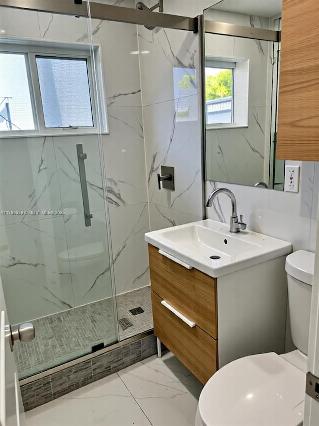 16204 NE 18th Ct, North Miami Beach, FL 33162 - bathroom with marble look tile flooring, toilet, a marble finish shower, and vanity