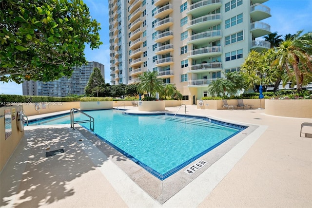 2475 Brickell Ave Unit 1805, Miami, FL 33129 - community pool with a patio area