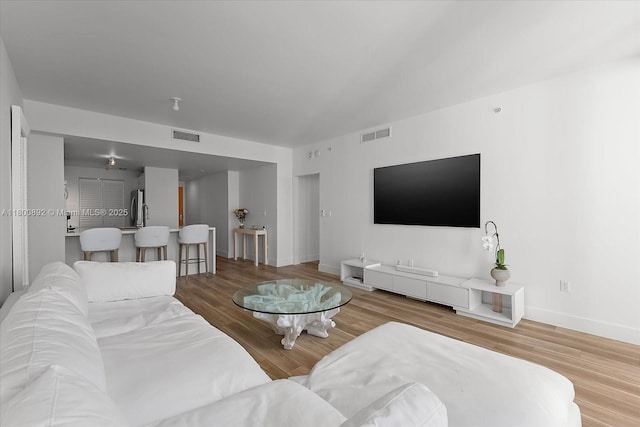 244 Biscayne Blvd Unit 2407, Miami, FL 33132 - living room with wood finished floors
