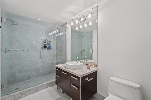 244 Biscayne Blvd Unit 2407, Miami, FL 33132 - bathroom featuring marble look tiles, vanity, and a shower stall