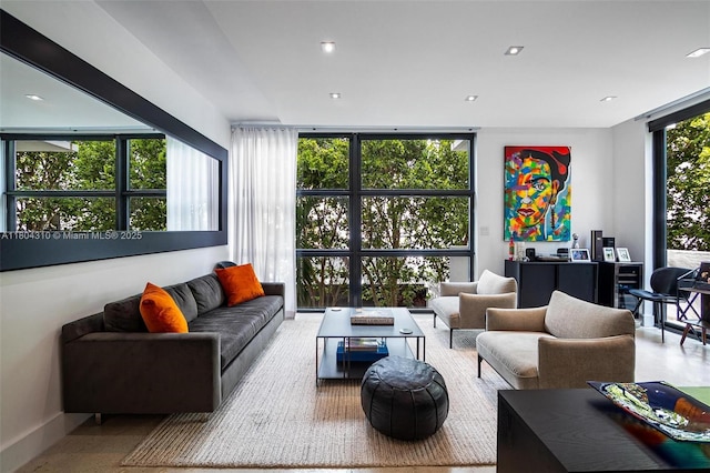 1024 Lenox Ave Unit 8, Miami Beach, FL 33139 - living area featuring floor to ceiling windows and baseboards