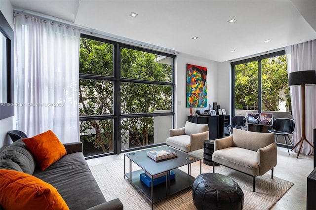 1024 Lenox Ave Unit 8, Miami Beach, FL 33139 - living area featuring a wall of windows and healthy amount of natural light