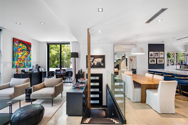 1024 Lenox Ave Unit 8, Miami Beach, FL 33139 - dining area featuring stairs and recessed lighting