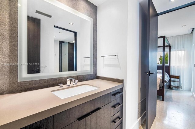 1024 Lenox Ave Unit 8, Miami Beach, FL 33139 - bedroom featuring access to outside, multiple windows, dark speckled floor, and baseboards