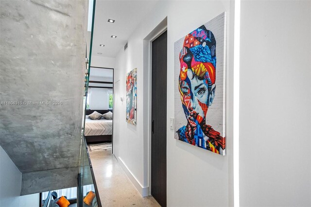 1024 Lenox Ave Unit 8, Miami Beach, FL 33139 - bedroom featuring baseboards and speckle patterned floor