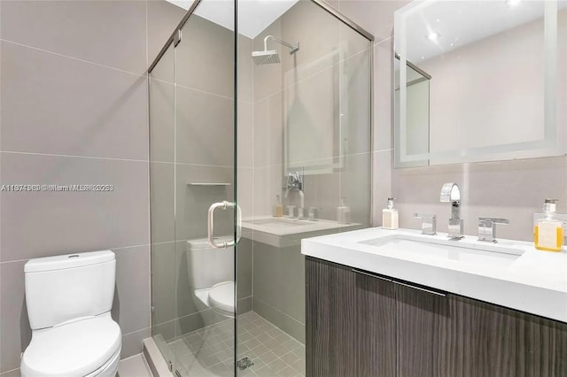1024 Lenox Ave Unit 8, Miami Beach, FL 33139 - full bathroom with vanity, a shower stall, and tile walls