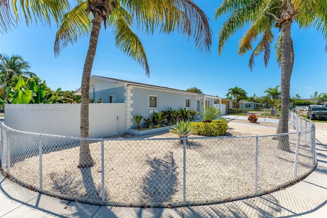 30701 SW 156th Ave, Homestead, FL 33033 - view of front facade with stucco siding and fence