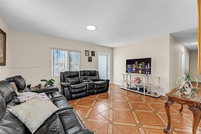 30701 SW 156th Ave, Homestead, FL 33033 - living area with a textured ceiling, baseboards, and recessed lighting