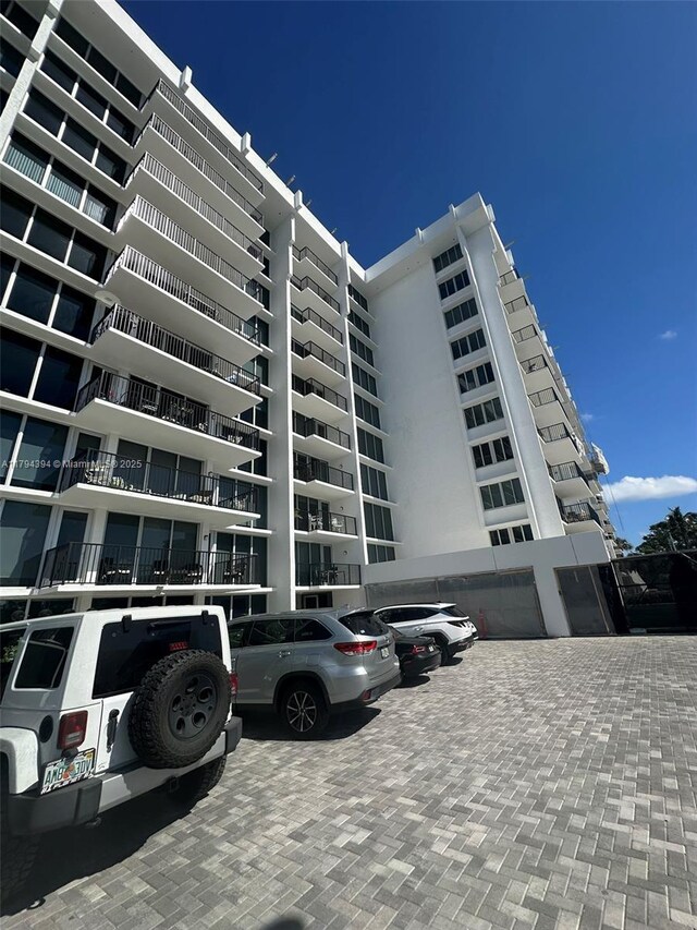 4750 S Ocean Blvd Unit 401, Highland Beach, FL 33487 - view of apartment building / complex