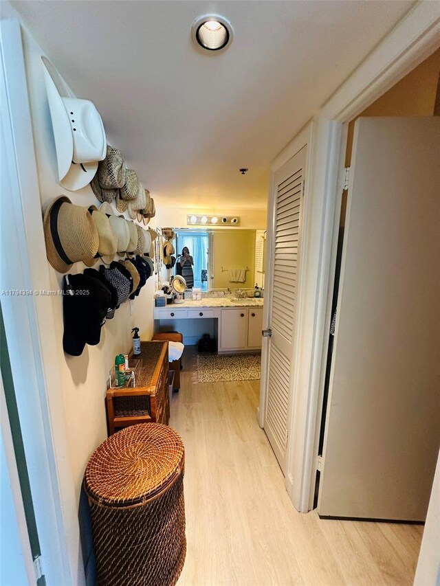 4750 S Ocean Blvd Unit 401, Highland Beach, FL 33487 - hallway with light wood-type flooring