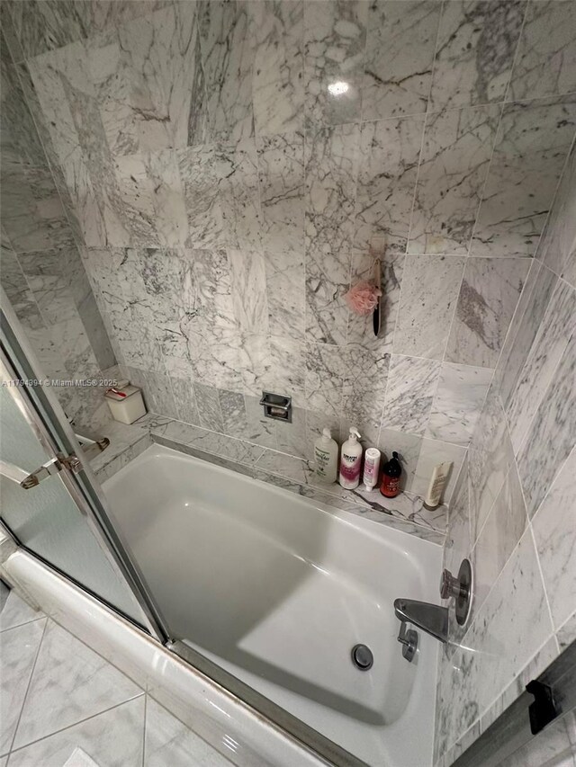 4750 S Ocean Blvd Unit 401, Highland Beach, FL 33487 - full bath with an enclosed shower and a tub