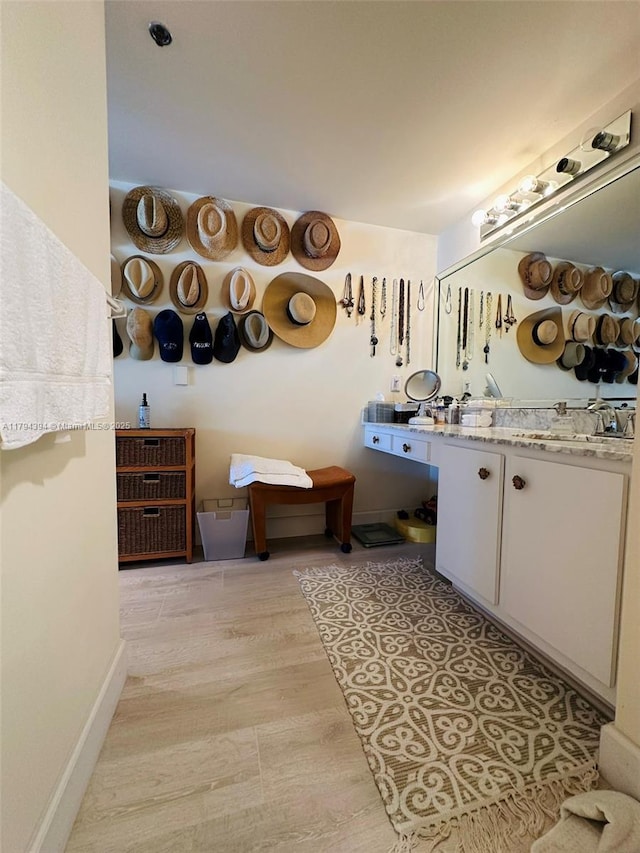 4750 S Ocean Blvd Unit 401, Highland Beach, FL 33487 - bathroom featuring vanity and baseboards