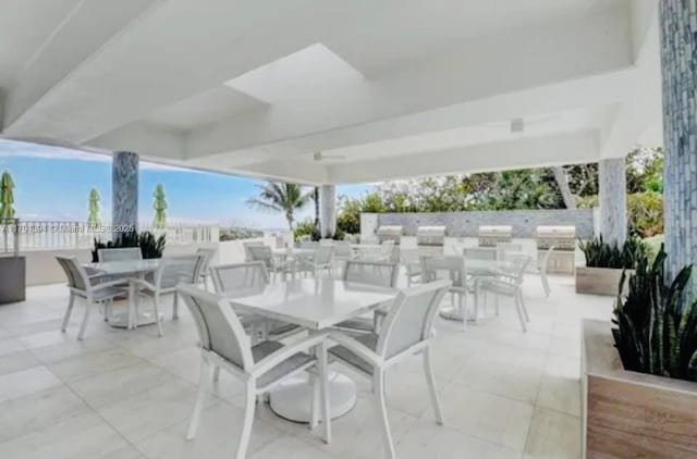 4750 S Ocean Blvd Unit 401, Highland Beach, FL 33487 - view of patio with outdoor dining space