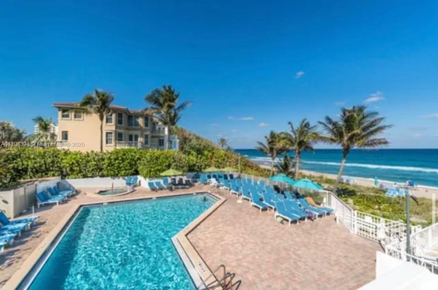 4750 S Ocean Blvd Unit 401, Highland Beach, FL 33487 - community pool with a water view and fence