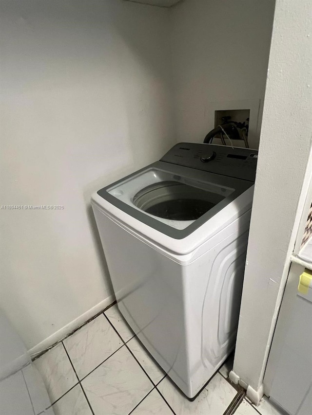 927 NE 199th St Unit 102, Miami, FL 33179 - clothes washing area with washer / clothes dryer
