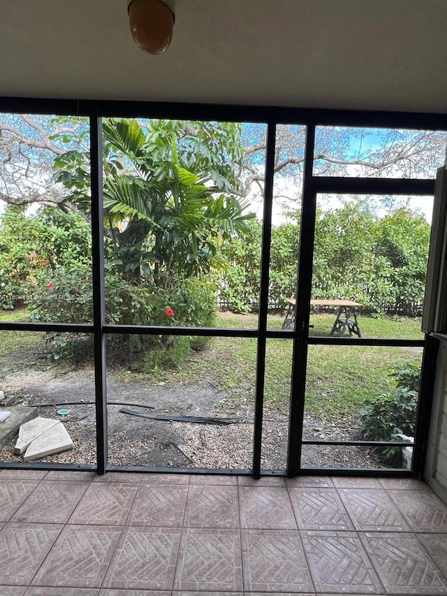 927 NE 199th St Unit 102, Miami, FL 33179 - view of unfurnished sunroom