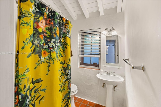 1301 Milan Ave Unit 1, Coral Gables, FL 33134 - bathroom featuring beamed ceiling, tile patterned floors, and toilet