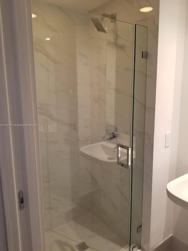 801 S Miami Ave Unit 1207, Miami, FL 33130 - full bathroom featuring a marble finish shower