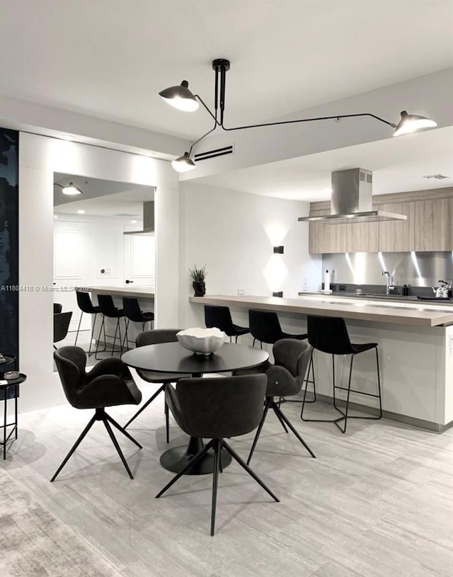 1000 Brickell Plz Unit 3308, Miami, FL 33131 - dining space featuring light wood finished floors