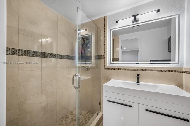4301 SW 85th Ave, Miami, FL 33155 - full bath with a shower stall, tile walls, and vanity
