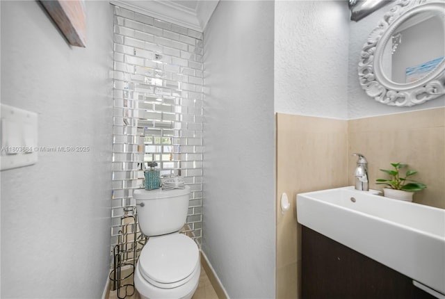 4301 SW 85th Ave, Miami, FL 33155 - half bathroom with toilet, ornamental molding, vanity, and a textured wall