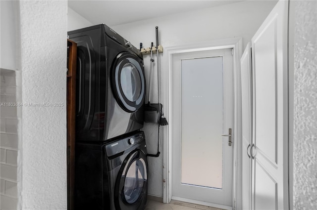 4301 SW 85th Ave, Miami, FL 33155 - laundry room featuring stacked washer / drying machine