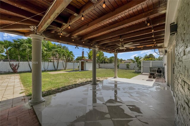 4301 SW 85th Ave, Miami, FL 33155 - view of patio featuring an outbuilding and a storage unit