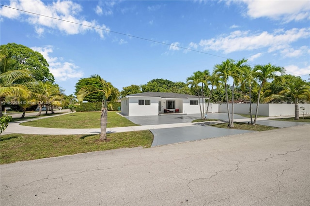 4301 SW 85th Ave, Miami, FL 33155 - view of front of house featuring asphalt driveway and stucco siding