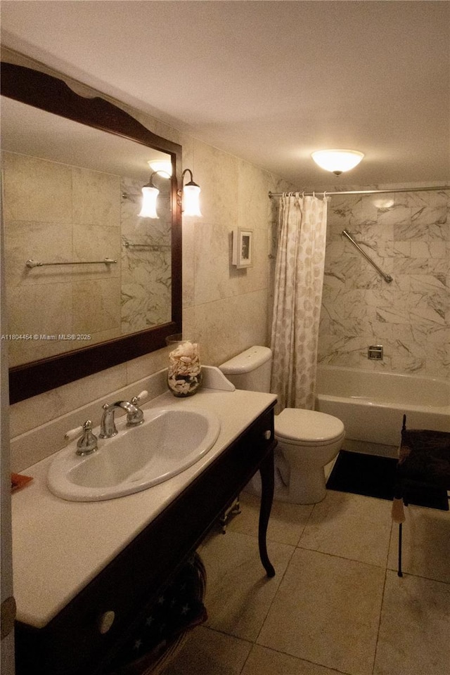 2555 Collins Ave Unit 308, Miami Beach, FL 33140 - full bathroom featuring toilet, vanity, tile patterned flooring, and shower / tub combo