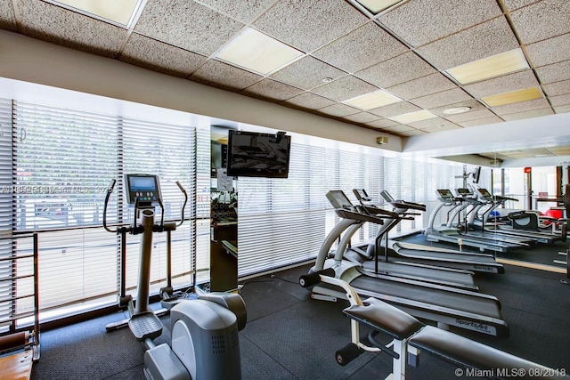 2555 Collins Ave Unit 308, Miami Beach, FL 33140 - exercise room with a drop ceiling