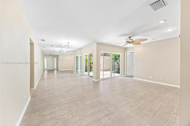 2717 N Carambola Cir N Unit 17101, Coconut Creek, FL 33066 - unfurnished room with light wood-style floors, baseboards, and a ceiling fan