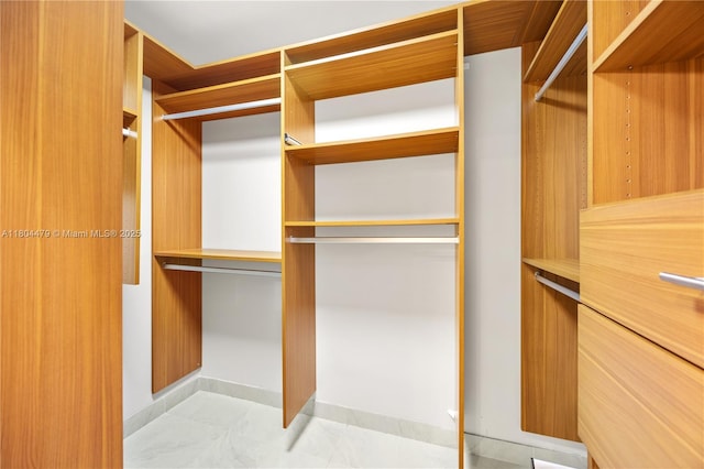 2717 N Carambola Cir N Unit 17101, Coconut Creek, FL 33066 - spacious closet featuring tile patterned floors