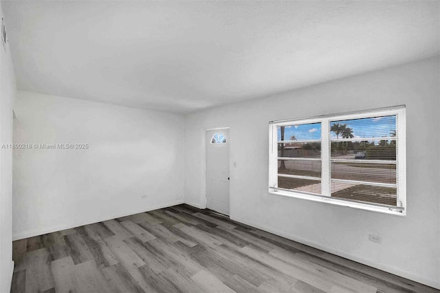 15351 SW 296th St, Homestead, FL 33033 - spare room featuring wood finished floors