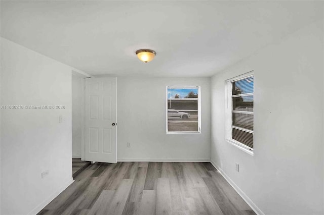 15351 SW 296th St, Homestead, FL 33033 - unfurnished room featuring wood finished floors and baseboards
