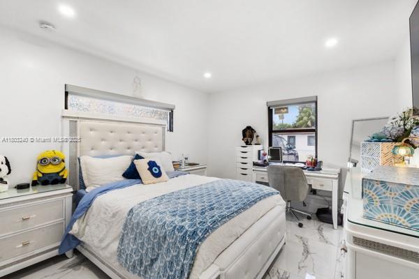 1594 W 73rd St, Hialeah, FL 33014 - bedroom with light marble finish flooring, recessed lighting, and an office area