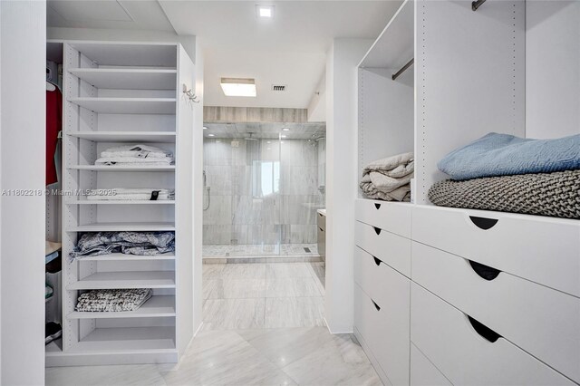 18201 Collins Ave Unit 808, Sunny Isles Beach, FL 33160 - walk in closet featuring marble finish floors