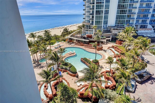 18201 Collins Ave Unit 808, Sunny Isles Beach, FL 33160 - view of pool with view of water and beach and a putting green